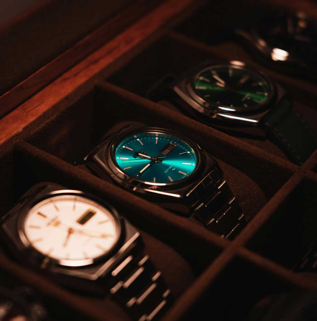 a group of watches in a box