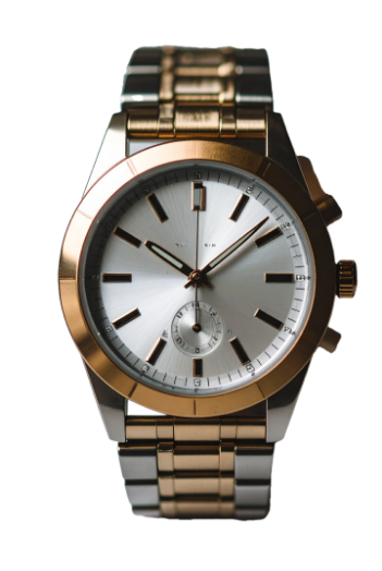 a close up of a silver and gold watch