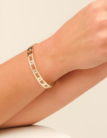 a woman wearing a necklace