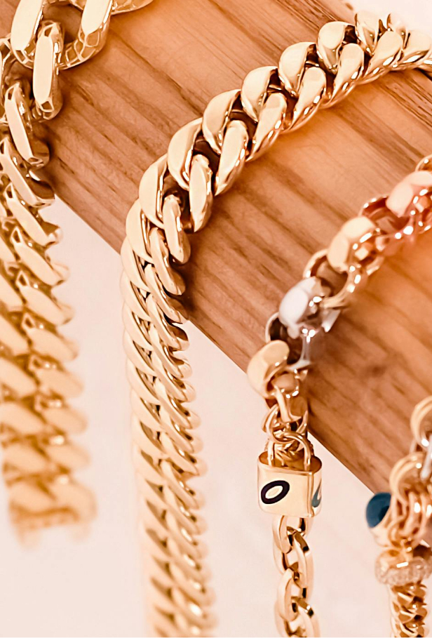 a group of gold chains