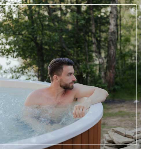 a man in a hot tub