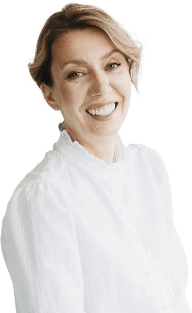 a woman smiling at the camera