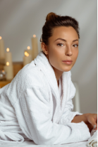 a woman in a white robe