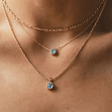 a necklaces on a person's neck