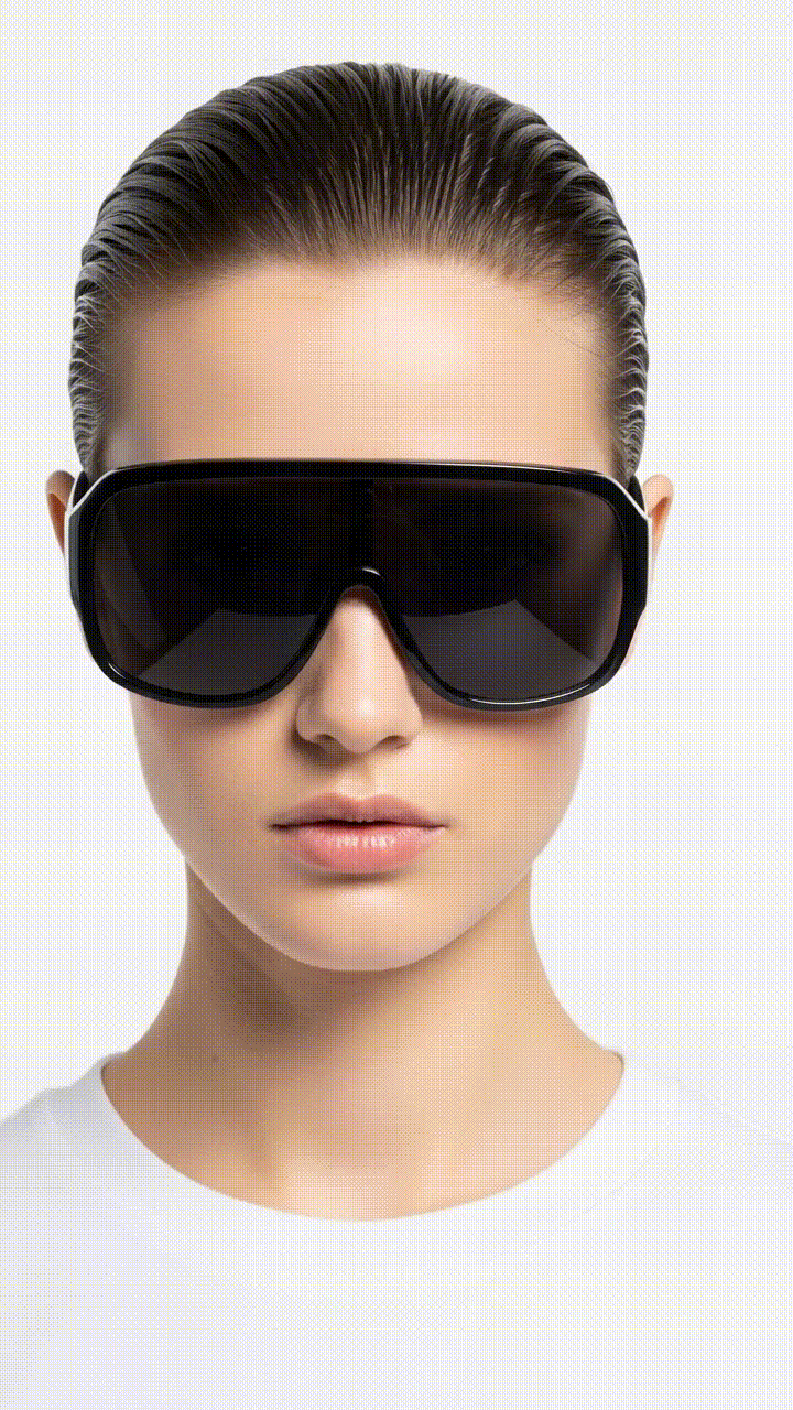 a woman wearing black sunglasses