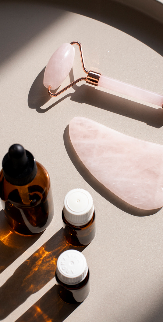 a group of essential oils and a roller