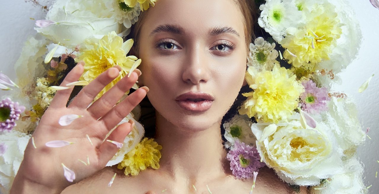 a woman with flowers in her hair