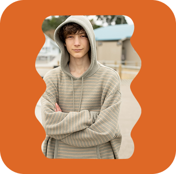 a girl jumping in the air with her hand up