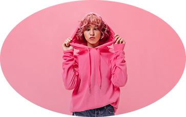 a woman wearing a pink hoodie