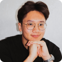 a person with glasses and a watch