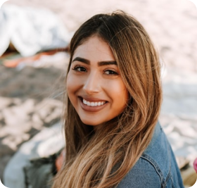 a woman smiling at the camera