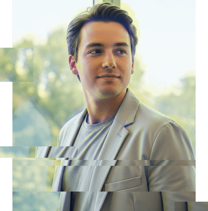 a man sitting at a desk with a computer
