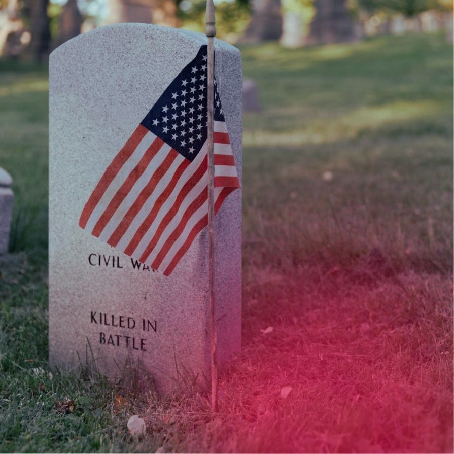 a flag on a grave stone