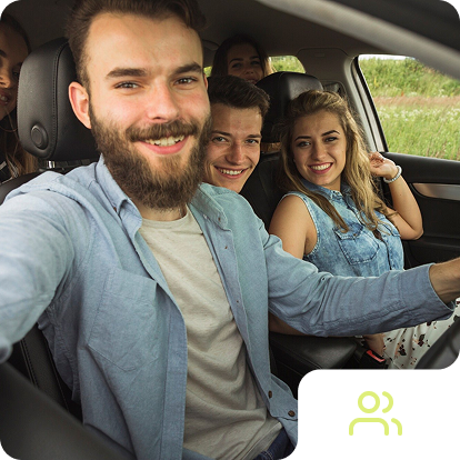 a group of people in a car