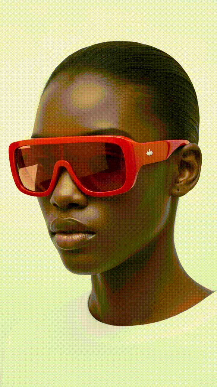 a woman wearing black sunglasses