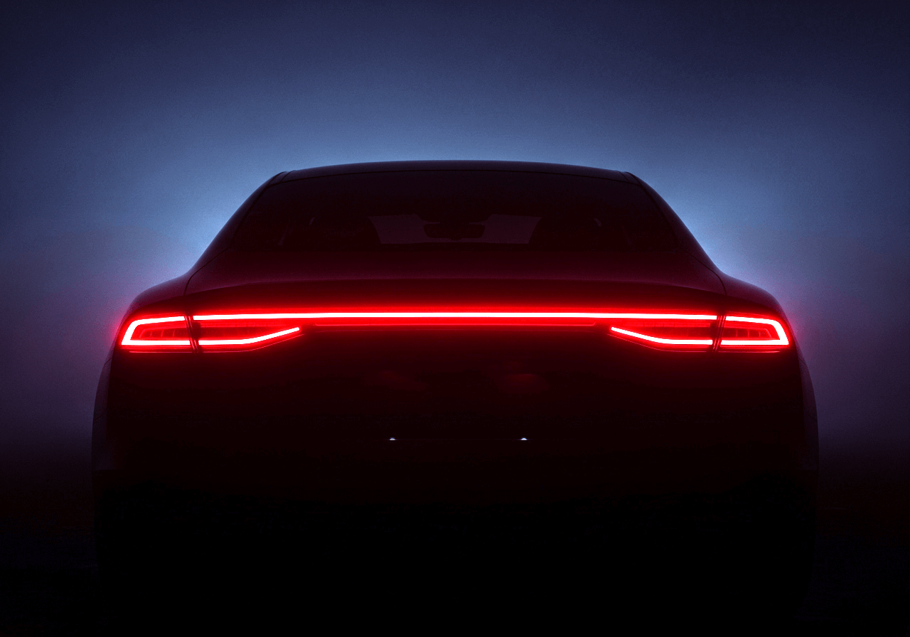 the back of a car with red lights