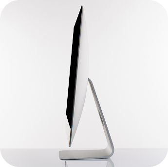 a white computer monitor on a white surface