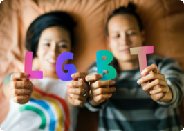 a couple holding letters in their hands