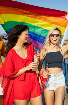 a group of women walking on a bridge