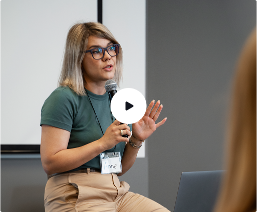 a woman holding a microphone