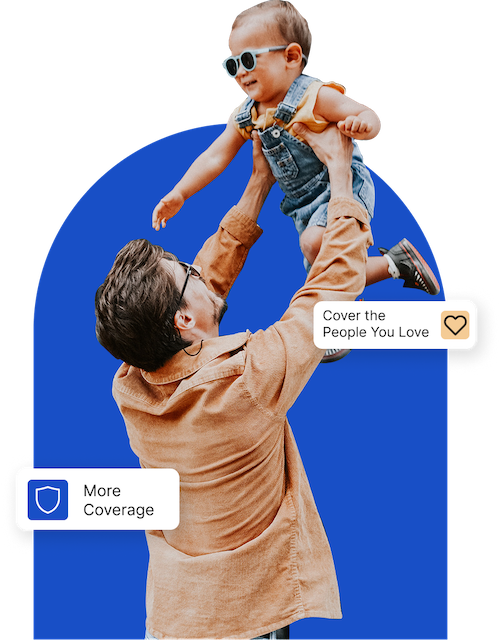 a man and woman sitting on a couch with a child