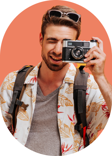 a man holding a camera to his face