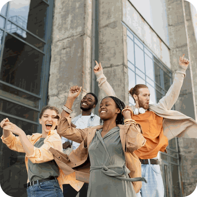 a group of people standing in front of a building
