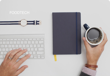 guy holding cup of coffee