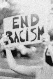 Photo Of Woman Holding An End Racism Sign