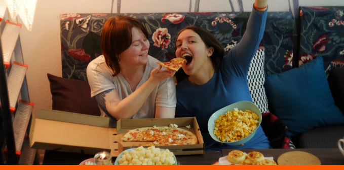 Watching TV- While Eating Pizza Image