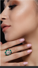 Woman Modeling A Green Ring
