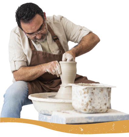 A Man Turning Clay Photo