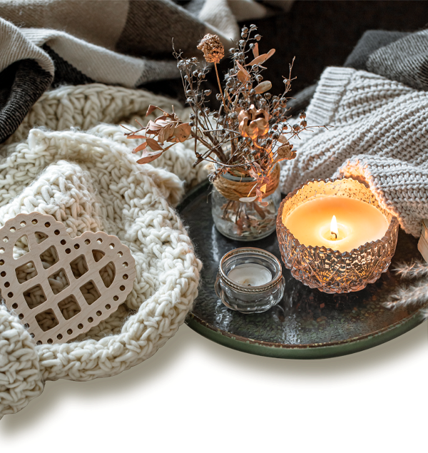 Knit items with candles and home decor