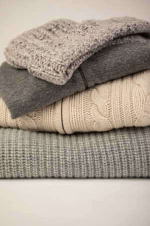 Pile of sweaters and knitwear