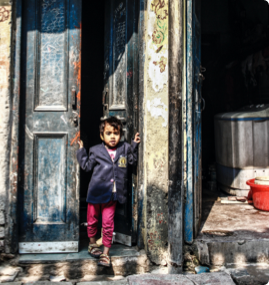 Child in an old home