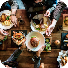 People Handing Over Burgers Photo