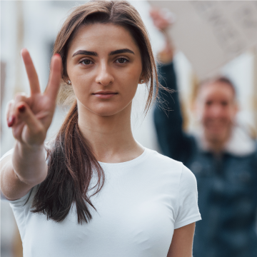 Woman Showing Peace Sign Photo