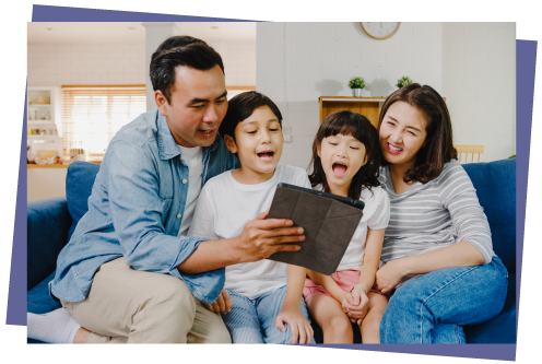 Family Looking At Tablet Photo
