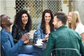 People Having A Good Time At A Coffee Table Photo