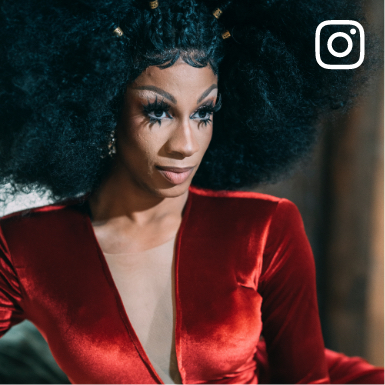Social media image of a black female artist wearing a beautiful red dress