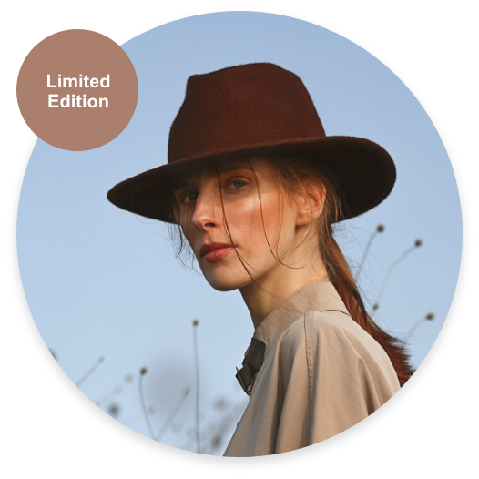 Young woman with brown hat
