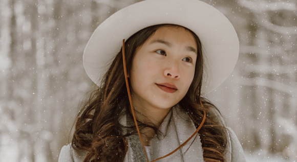 Woman wearing a hat in winter