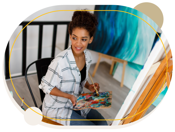 Woman Holding Brush And Palette Photo