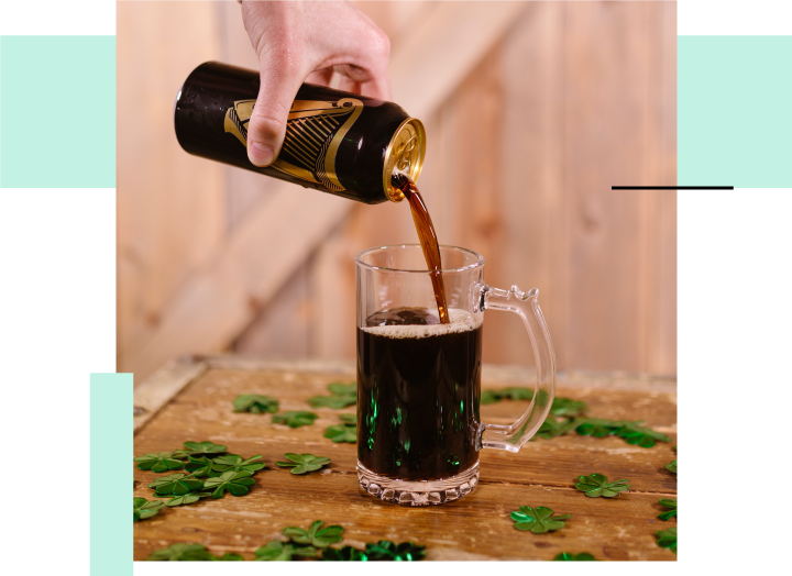 Hand Pouring Guinness Beer Photo