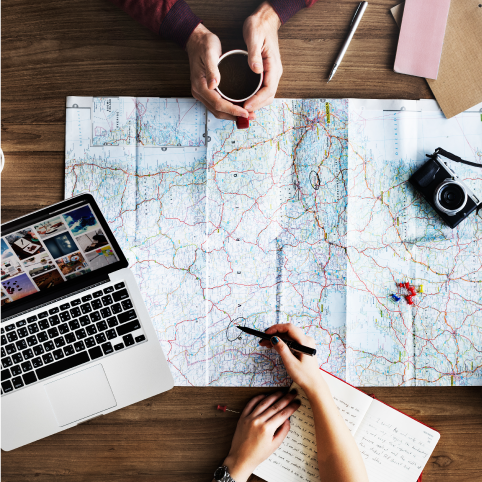 People Planning On A Map Photo