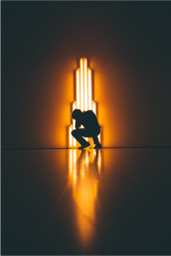Man In Front Of A Lighting Art Installation