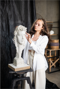 Woman Touchin A Sculpture
