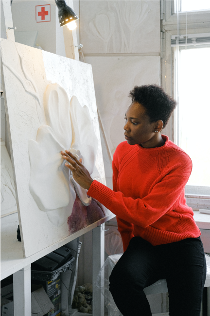 Woman Sculpting On Canvas