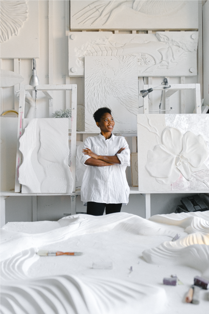 Woman In Front Of Her Artworks