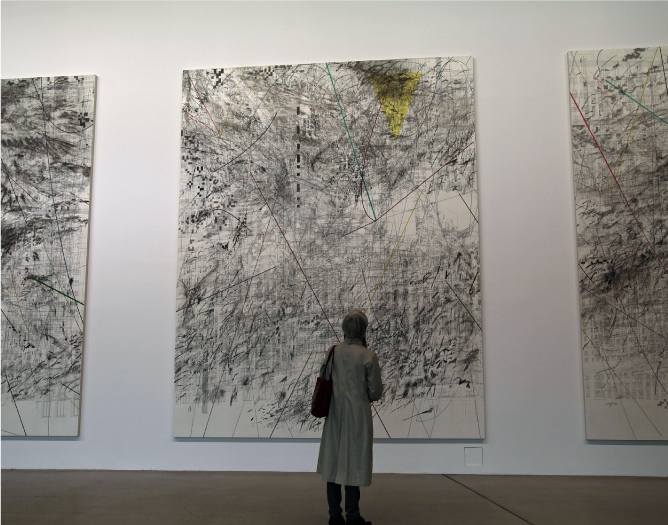 Woman In Front Of An Abstract Painting